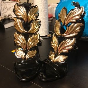 Black/gold patent heels